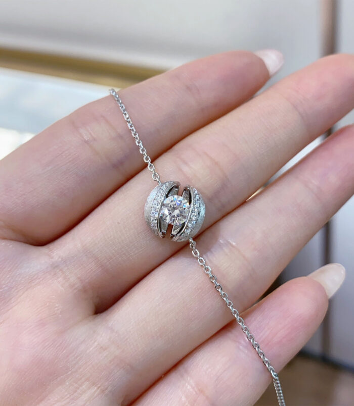 calla lily Silver bracelet Handheld Detail handheld close-up of Rhodium plated 925 silver bracelet, highlighting its unique design like a calla lily