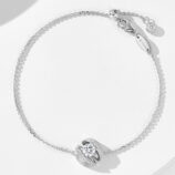 Rhodium-plated 925 silver bracelet with a round cubic zirconia centerpiece, adjustable chain, with "AG925" stamp and lobster clasp.