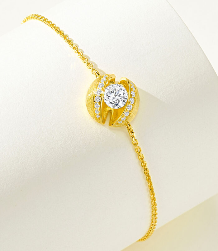 Gold plated Silver Bracelet Side View side view of a gold plated silver bracelet with sparkling cubic zirconia stones