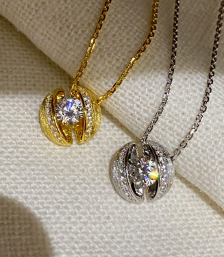 Sterling silver brushed calla lily necklace color comparison Sterling silver brushed calla lily necklace color comparison: yellow gold color vs. white gold color