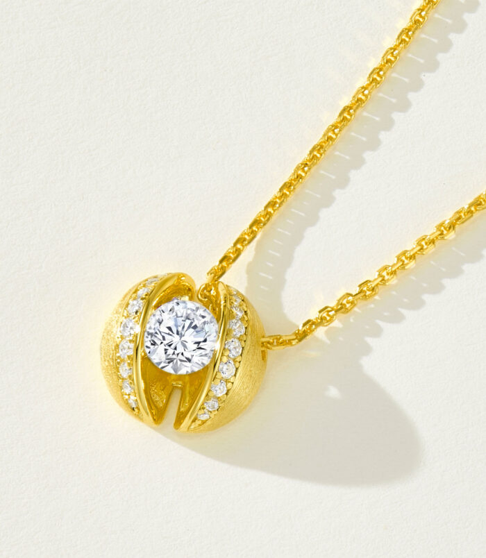 side view close-up of gold plated Sterling silver brushed calla lily necklace