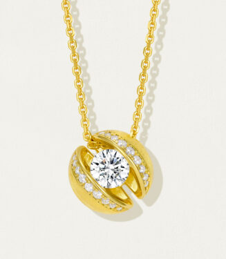 Stylish gold-plated sterling silver pendant necklace featuring a round brilliant-cut white cubic zirconia stone at the center, surrounded by smaller round brilliant-cut white cubic zirconia stones set in a sleek and modern open-circle design, creating a sophisticated and eye-catching look perfect for adding a touch of glamour to any outfit.