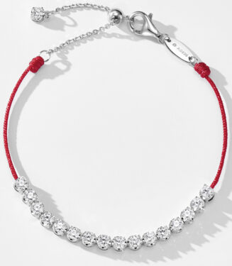 Full view of Rhodium plated 925 silver bracelet with cubic zirconia stones and a red string