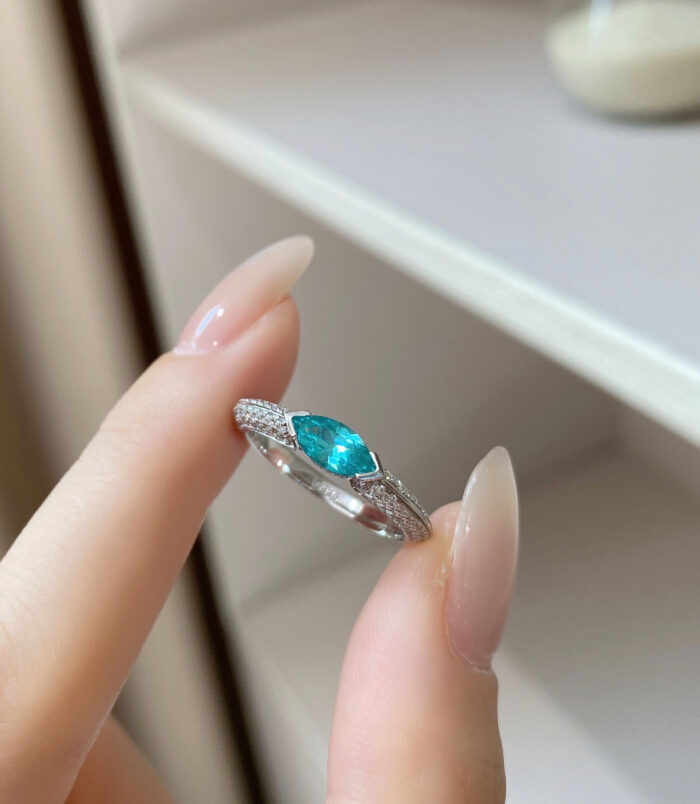 Close-up of marquise Paraiba 925 silver ring with 5A zircon stone