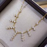 Sterling silver tassel necklace on a box